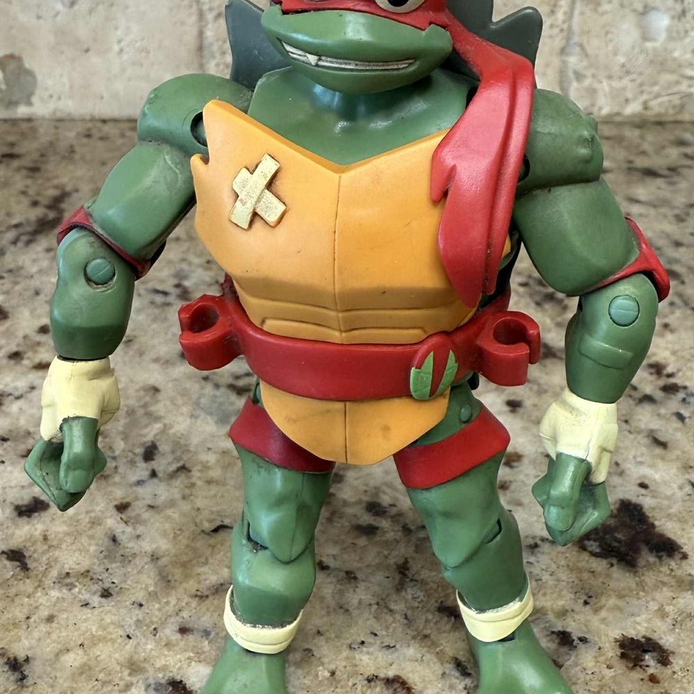 Reptile Action Figure with Red and Green Colors